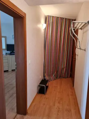 a room with a hallway with a room with a room at Entire apartment 4pax , sea view, pool in Ravda