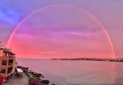 twobows in the sky over a body of water at Studio Kikki Sozopol in Sozopol