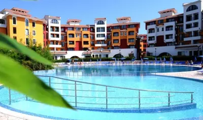 a large swimming pool with buildings in the background at Victoria's apartments -Marina Cape - Aheloy in Aheloy