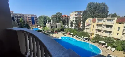 a view of a swimming pool from a balcony at Kalia Sunny Beach 1 bedroom apartment in Sunny Beach
