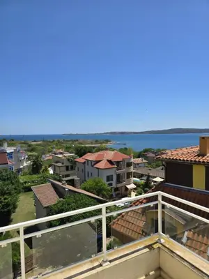 a view of the water from the balcony of a building at Апартамент 