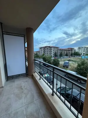 a balcony with a white screen on a building at Sveti vlas apartament Sorrento Sole Mare V&D Luxury Style Apartment Свети-влас апартамент студио in Sveti Vlas