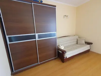 a small room with a closet with a bed in it at Sea Apartament Kristal Beach,Nessebar in Nesebar