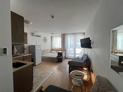 a room with a kitchen and a living room at Apartament Studio Bułgaria Garden Of Eden in Sveti Vlas