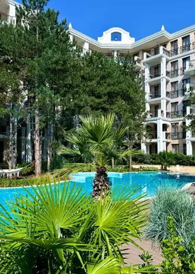 a large apartment building with a large swimming pool at Harmony Grand Resort - Apartament Gut in Sunny Beach