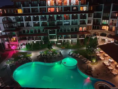 an overhead view of a pool in front of a building at Olymp SkyView Apartment in Sveti Vlas