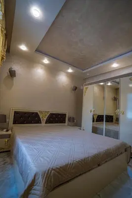 a bedroom with a large bed in a room at AR Luxury VIP Apartments Ravda in Ravda
