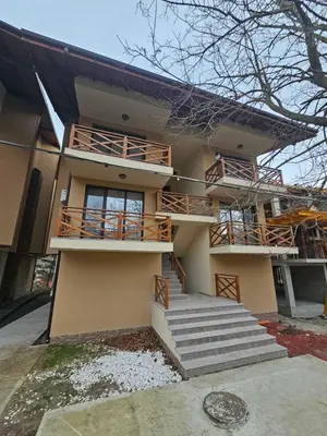 a building with stairs and balconies on it at Denevi' seaside apartment - 2 bedrooms in Lozenets