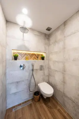 a bathroom with a toilet and a shower at Lazur Sea View in Burgas City