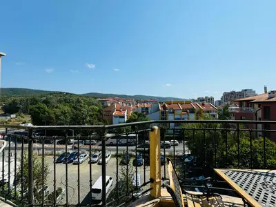 a balcony with a view of a parking lot at AMADEUS I B31 Apartment Sunny Beach in Sunny Beach