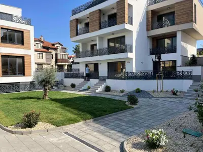 a person standing in front of a building at Студио Морски дни-топ локация в Созопол in Sozopol