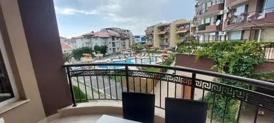 a balcony with a view of a city at Marina bay in Sveti Vlas