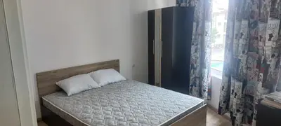 a small bed in a room with a window at Marina bay in Sveti Vlas