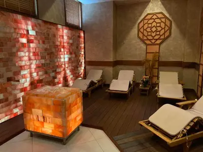 a room with a bunch of beds in a room at Emerald Beach Resort & Spa in Ravda