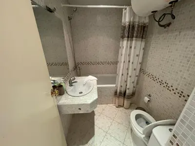 a bathroom with a sink and a toilet at Charming 1 bedroom apartment in Sunny Beach in Sunny Beach