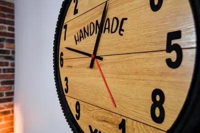 a wooden clock with the words handmade on it at Handmade - central studio in Varna City