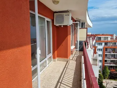 a balcony of a building with an air conditioner on it at Roof top sea view apartment 167,2ložnice,4-7 osob in Sveti Vlas