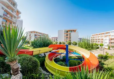 a row of colorful inflatable boats in a park at 1kk ve Sveti Vlas in Nesebar