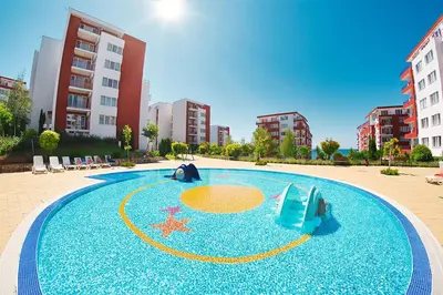 a swimming pool with a starfish and a water slide at 1kk ve Sveti Vlas in Nesebar