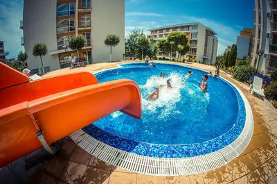 a group of people in a swimming pool at 1kk ve Sveti Vlas in Nesebar