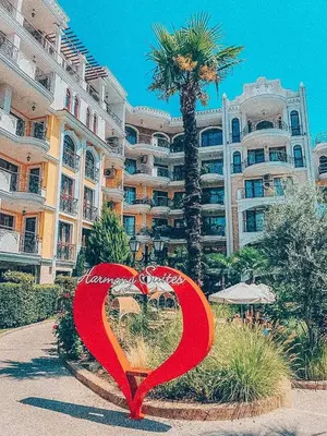 two heart signs in front of a large building at Urlaub in Harmony in Sunny Beach