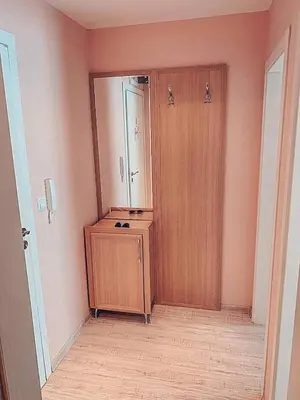 a room with a wooden door and a wooden floor at Urlaub in Harmony in Sunny Beach