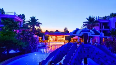 a resort with a swimming pool at night at Attractive Studio-Apartment in Sunny Beach Cascadas Family Resort in Sunny Beach