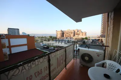 a balcony with a view of a city at Menada Dune Residence Apartments in Sunny Beach