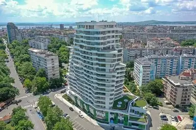 an aerial view of a tall building in a city at Cosy apartment near the beach with terrace & sea view in Burgas City