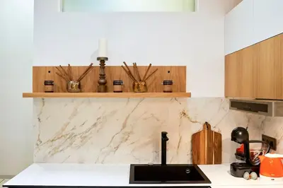 a kitchen with a counter top with a sink at Studio in the Center of Burgas next to the See in Burgas City