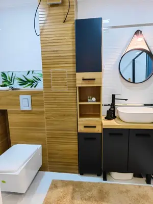 a bathroom with a sink and a mirror at Апартамент BLUE CREAM in Burgas City