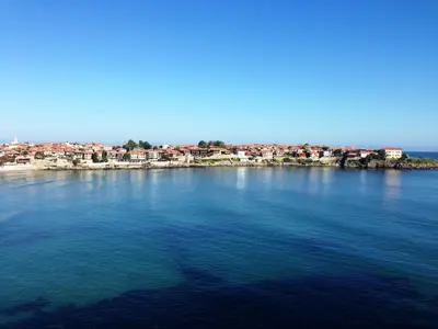 a large body of water with a city in the background at Hotel Parnasse in Sozopol