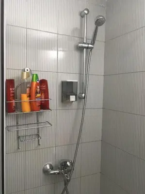 a shower in a bathroom with a glass door at Varna Heart Studio in Varna City