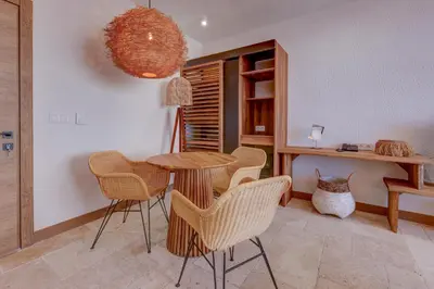 a dining room with a table and chairs at La Boheme - Adults Only in Obzor
