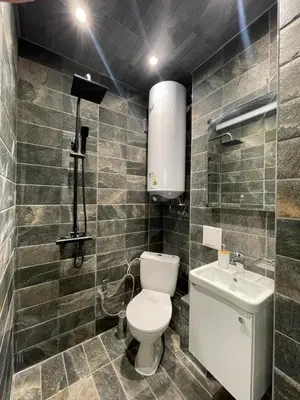 a bathroom with a toilet and a sink at Varna Centre Apartment 2 in Varna City