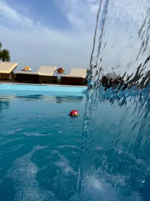 a splash of water in a swimming pool at Black Sea Villas Fichoza in Varna City