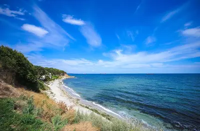 a view of a beach with the ocean at Black Sea Villas Fichoza in Varna City
