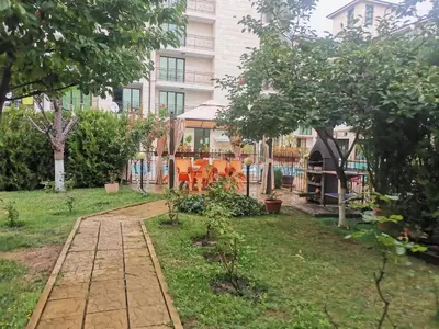 a garden in front of a building at Best Location in Sunny Beach Amber Beach in Sunny Beach