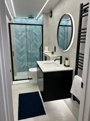 a bathroom with a sink and a mirror at Apartment Ivan in Pomorie