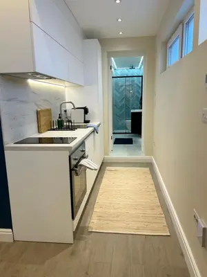 a kitchen with a sink and a counter top at Apartment Ivan in Pomorie
