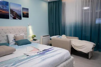 a hotel room with two beds and azeb sidx sidx sidx at Sea Bliss in Burgas City