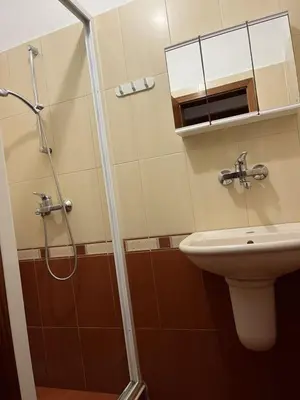 a bathroom with a shower and a sink at Apartment Geni in Pomorie