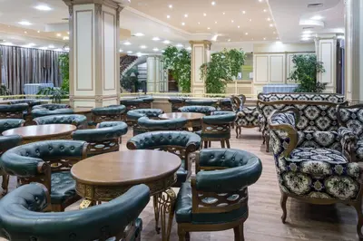 a room filled with tables and chairs and tablesktop at Tiara Beach - All Inclusive in Sunny Beach