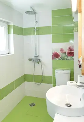 a green and white bathroom with a sink and a shower at Modern 2-Level Apartment with Balcony in Varna by Flat Mаnager in Varna City