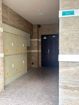 a room with lockers and a blue door at Salt Lake Studio in Pomorie