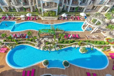 an aerial view of a resort with a swimming pool at VIP Harmony Suites 20 SVETY VLAS in Sveti Vlas