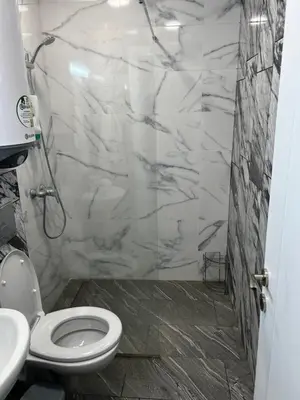 a bathroom with a toilet and a sink at Obzor in Obzor