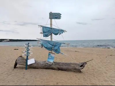 a model of a boat on the beach at Sozopol Sunrise in Sozopol