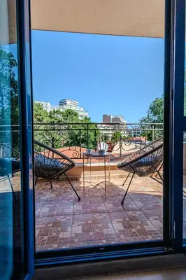 a view of a patio through a window at Bella Mare Boutique apartment in Sunny Beach
