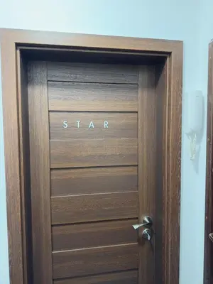 a wooden door with the word star written on it at Star in Varna City